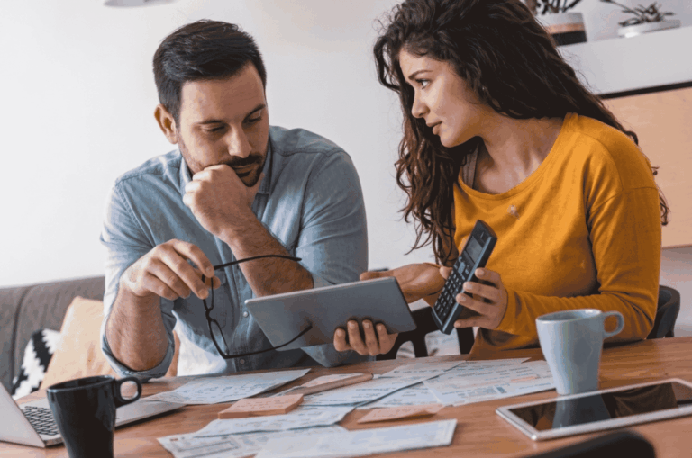 Best budgeting apps for couples dashboard showing shared expenses, joint goals, bill splitting, and transaction history for two partners