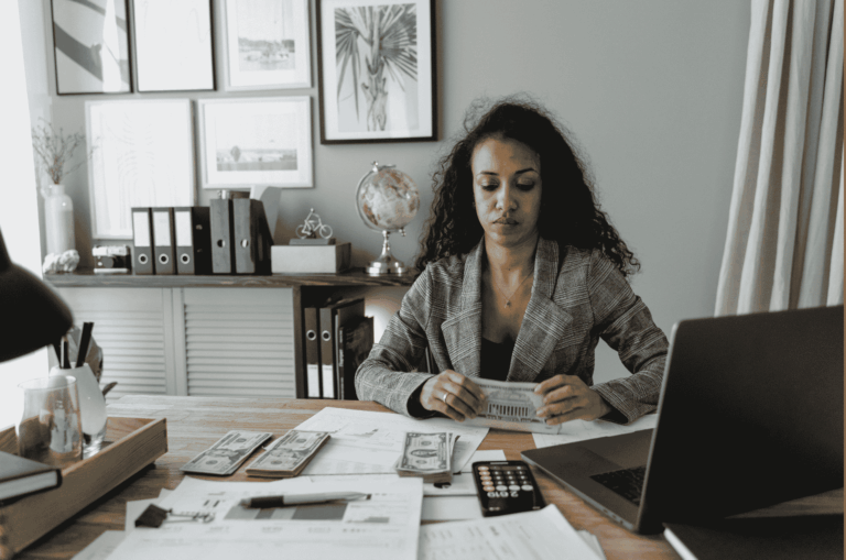 How to stop living paycheck to paycheck in 2026: 7 steps showing calculate real wage, track spending, zero-based budget, build $500 buffer, automate savings, reduce expenses, and increase income with side hustles
